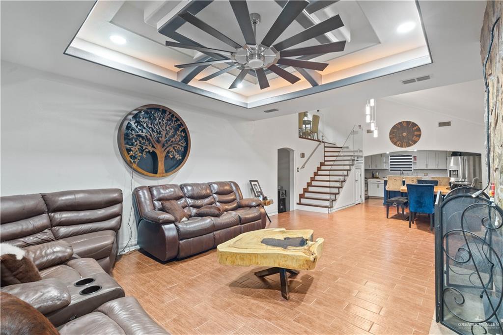 415 North 8th Street Hidalgo, TX 78557 - Photo 5 of 21 a living room with furniture and a large window