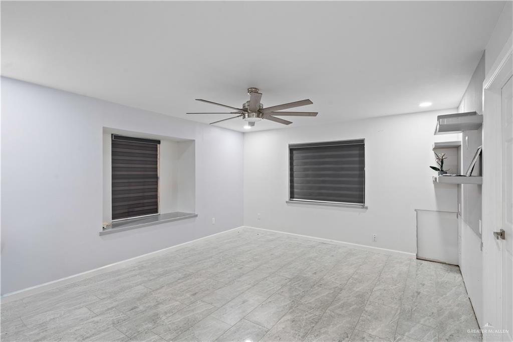 415 North 8th Street Hidalgo, TX 78557 - Photo 8 of 21 a view of an empty room with a window