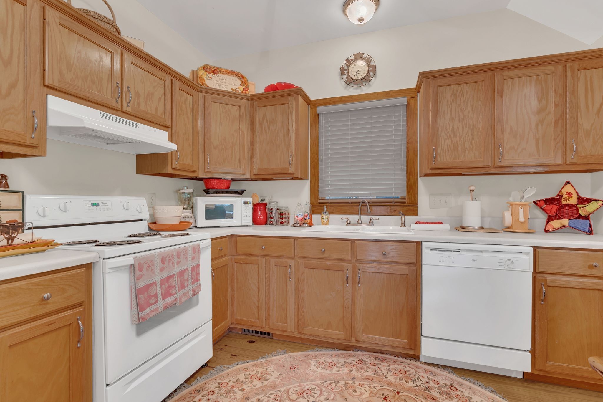 110 Village Way Lancaster, TN 38569 - Photo 12 of 27 a kitchen with a sink stove and cabinets