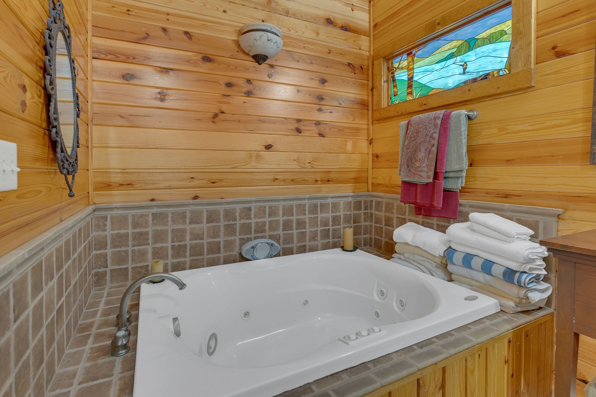 110 Village Way Lancaster, TN 38569 - Photo 20 of 27 a bathroom with a bathtub and shower