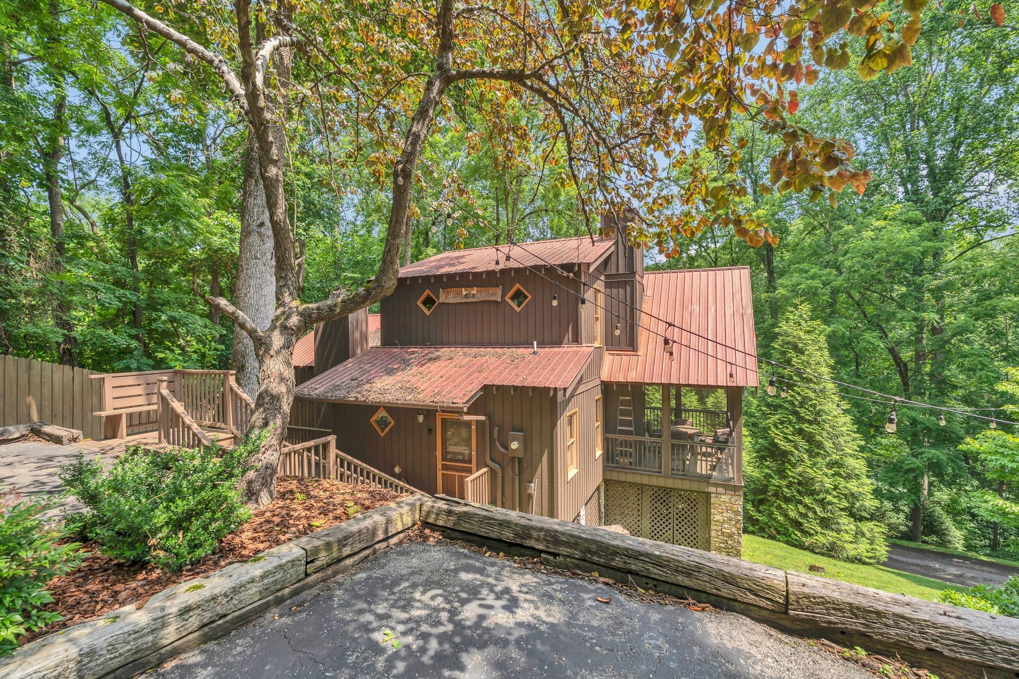 110 Village Way Lancaster, TN 38569 - Photo 3 of 27 an aerial view of a house with a yard