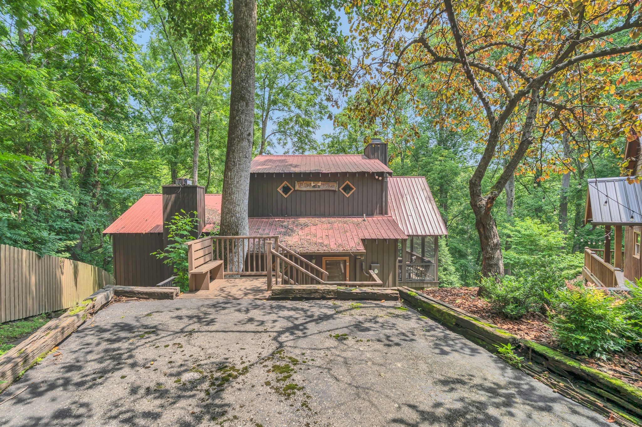 110 Village Way Lancaster, TN 38569 - Photo 4 of 27 front view of a house with a yard
