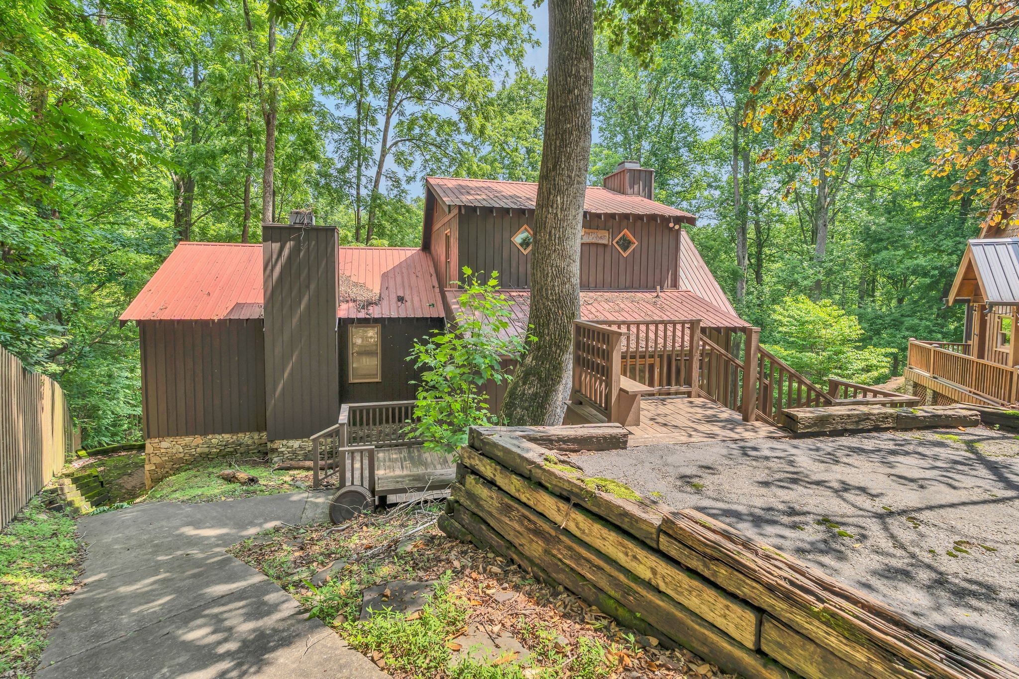 110 Village Way Lancaster, TN 38569 - Photo 5 of 27 a front view of a house with a yard