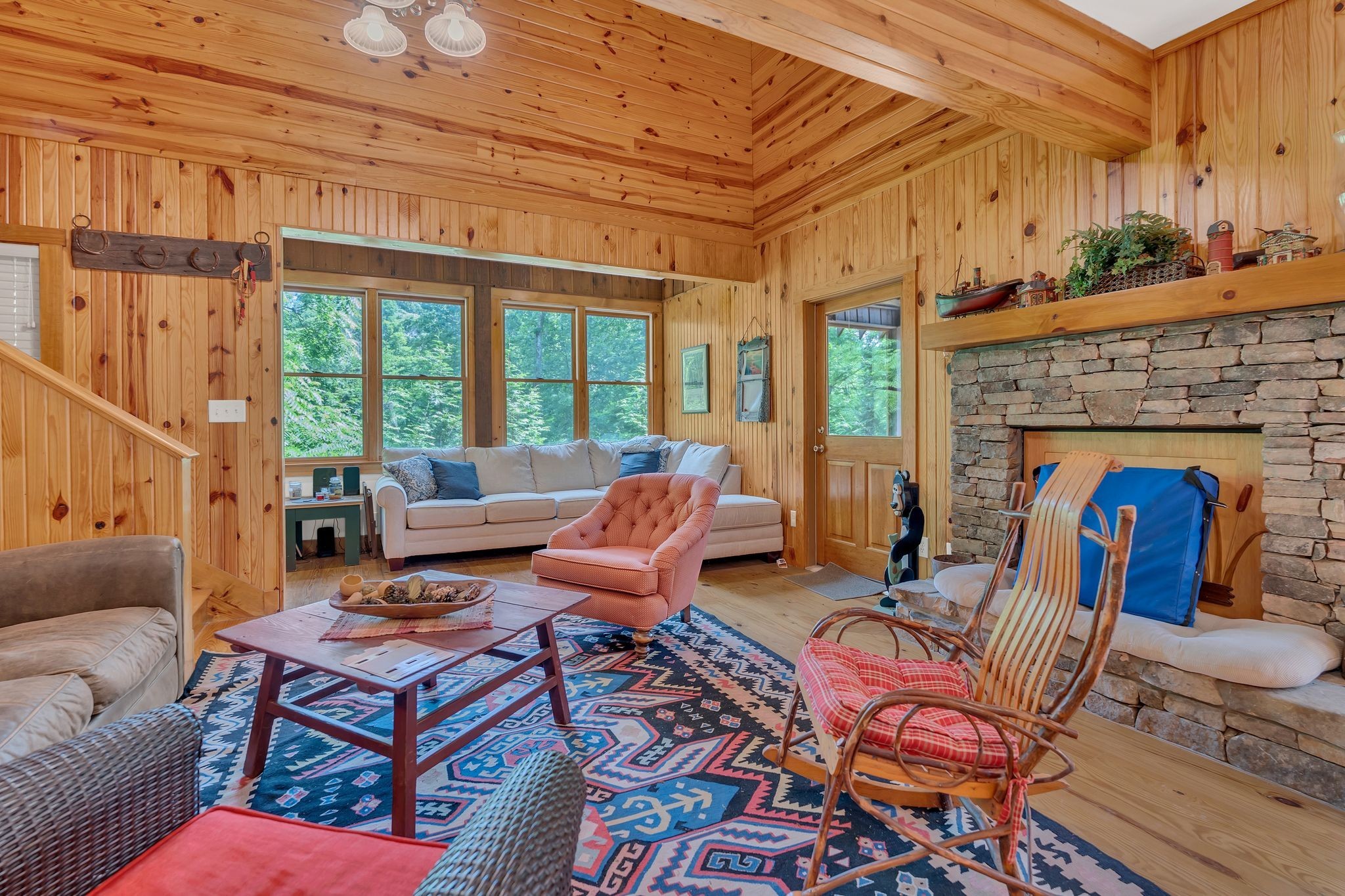 110 Village Way Lancaster, TN 38569 - Photo 8 of 27 a living room with furniture a fireplace and a table