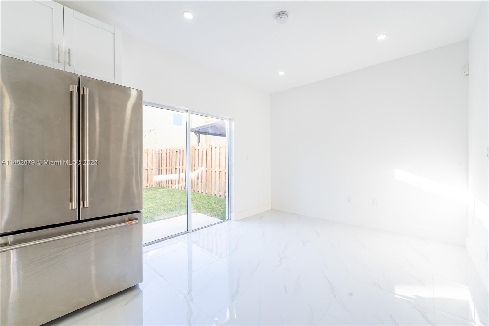 14346 Southwest 134th Place Miami, FL 33186 - Photo 11 of 36 a view of an empty room with a window