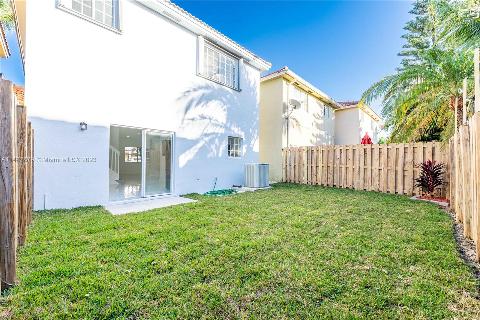 14346 Southwest 134th Place Miami, FL 33186 - Photo 27 of 36 a view of a back yard
