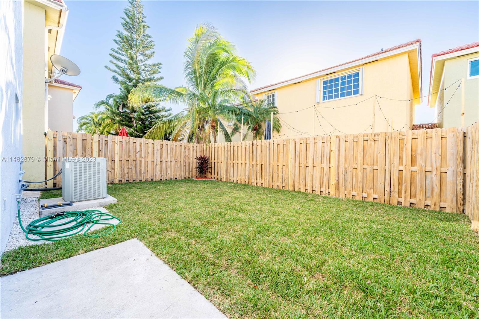 14346 Southwest 134th Place Miami, FL 33186 - Photo 28 of 36 a view of a backyard with a garden