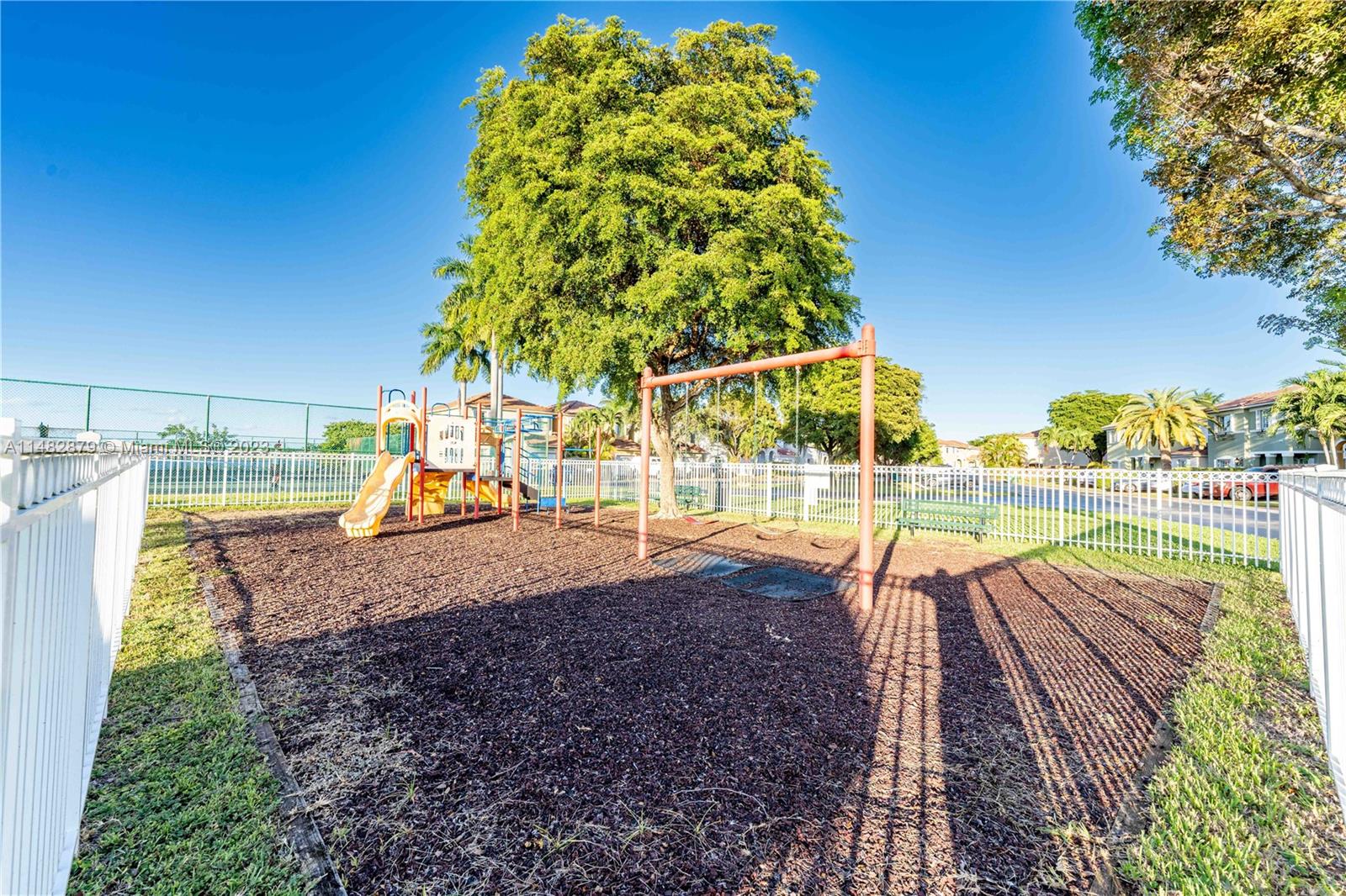 14346 Southwest 134th Place Miami, FL 33186 - Photo 29 of 36 a view of a swimming pool with a patio