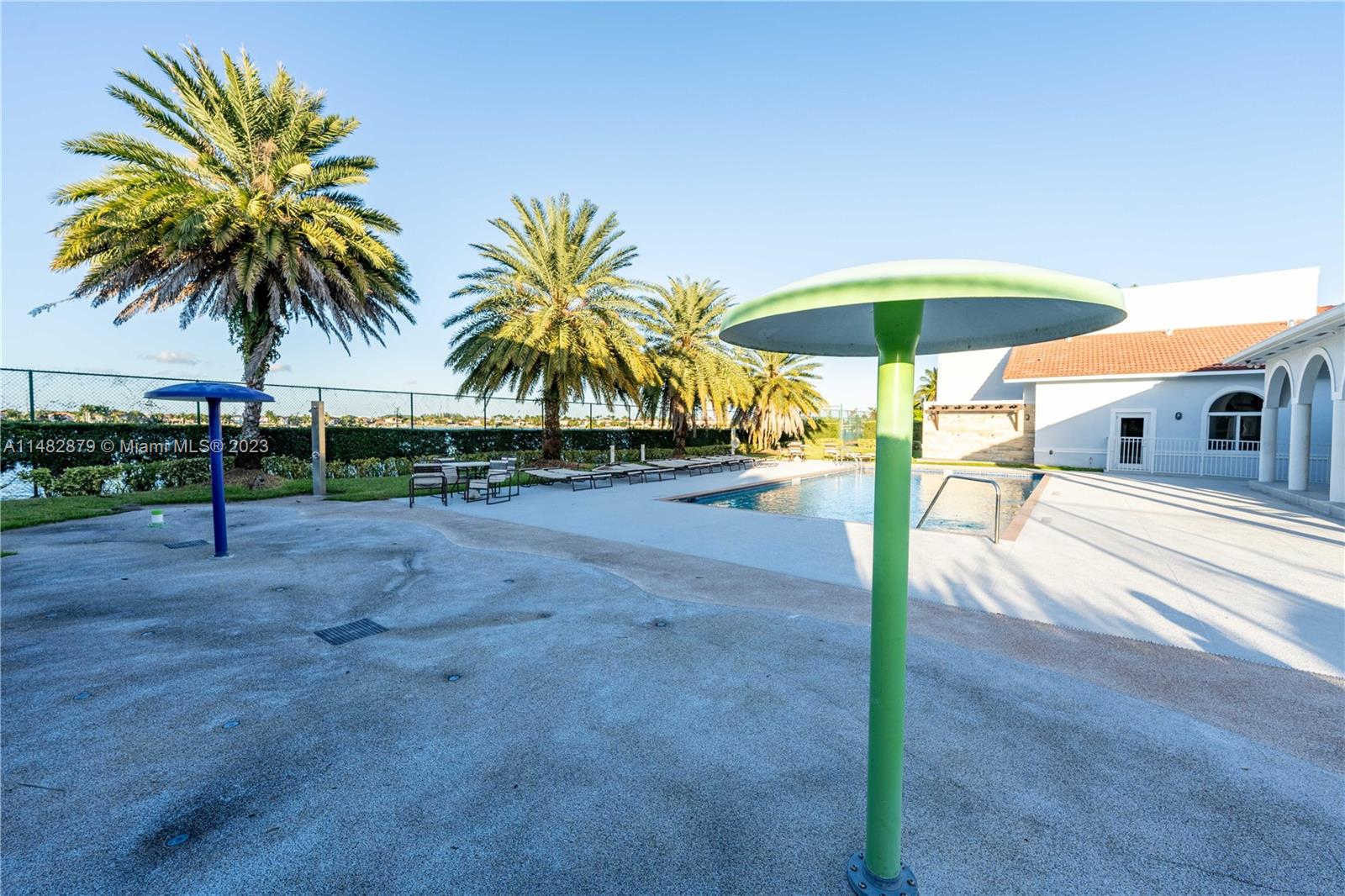 14346 Southwest 134th Place Miami, FL 33186 - Photo 35 of 36 a view of a backyard and swimming pool