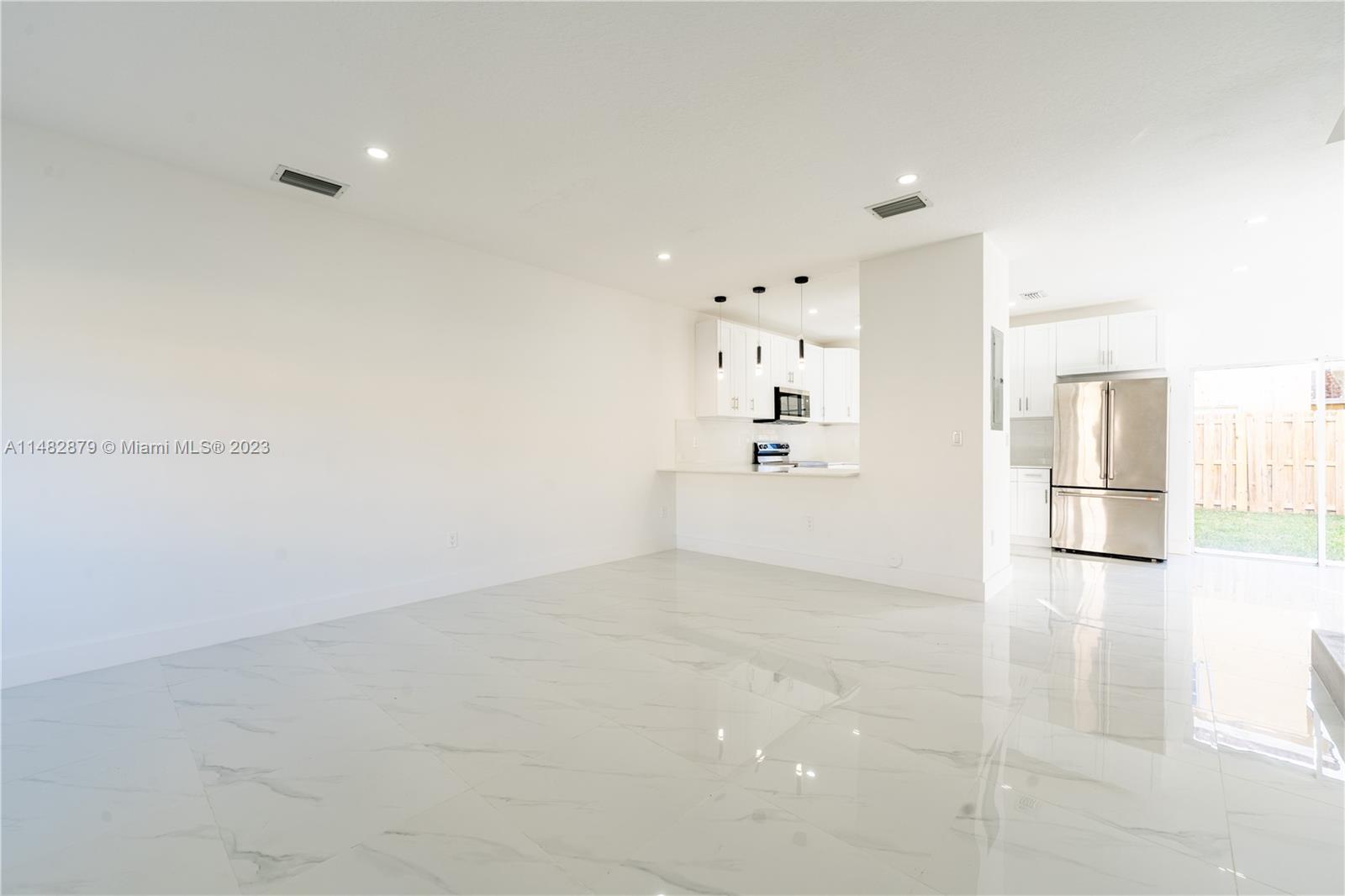 14346 Southwest 134th Place Miami, FL 33186 - Photo 4 of 36 a view of empty room