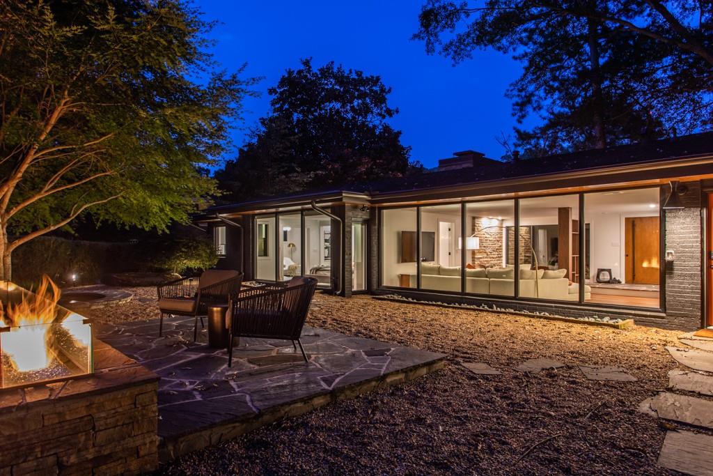 1904 Lenox Road Northeast Atlanta, GA 30306 - Photo 11 of 56 a view of a house with backyard sitting area and garden