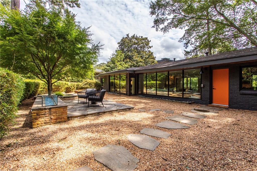 1904 Lenox Road Northeast Atlanta, GA 30306 - Photo 14 of 56 a view of a house with backyard porch and sitting area