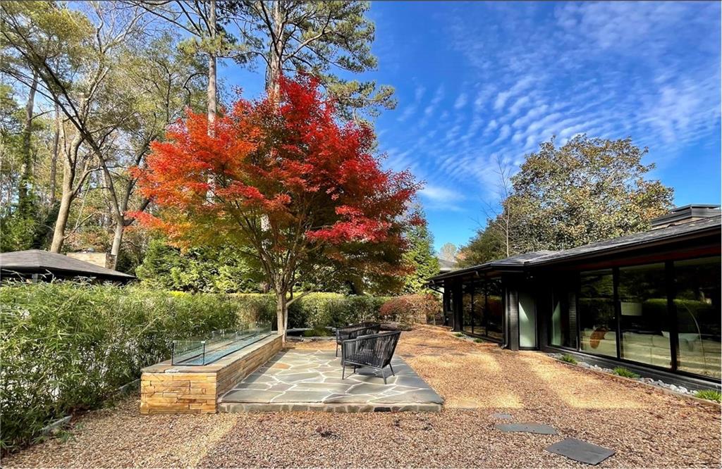 1904 Lenox Road Northeast Atlanta, GA 30306 - Photo 15 of 56 a view of a backyard with sitting area and furniture