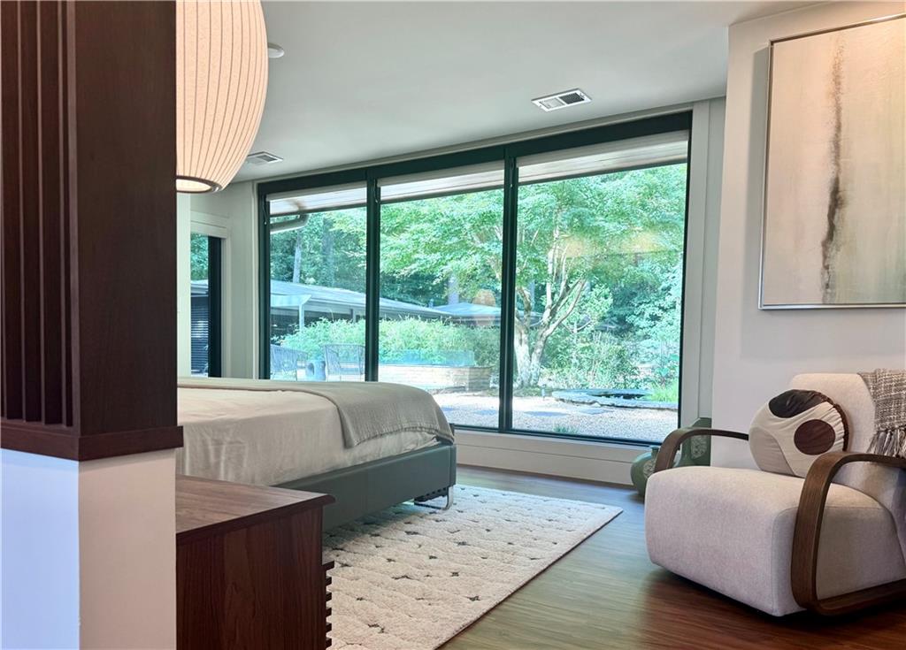 1904 Lenox Road Northeast Atlanta, GA 30306 - Photo 24 of 56 a living room with furniture and a large window