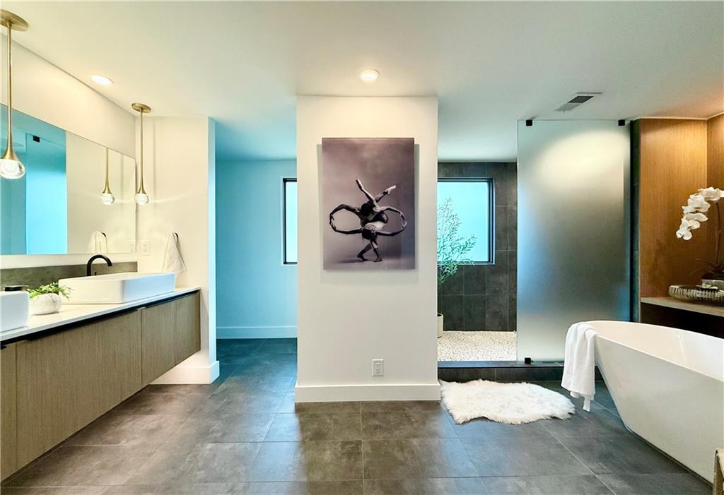 1904 Lenox Road Northeast Atlanta, GA 30306 - Photo 25 of 56 a view of a bathroom with sink and mirror