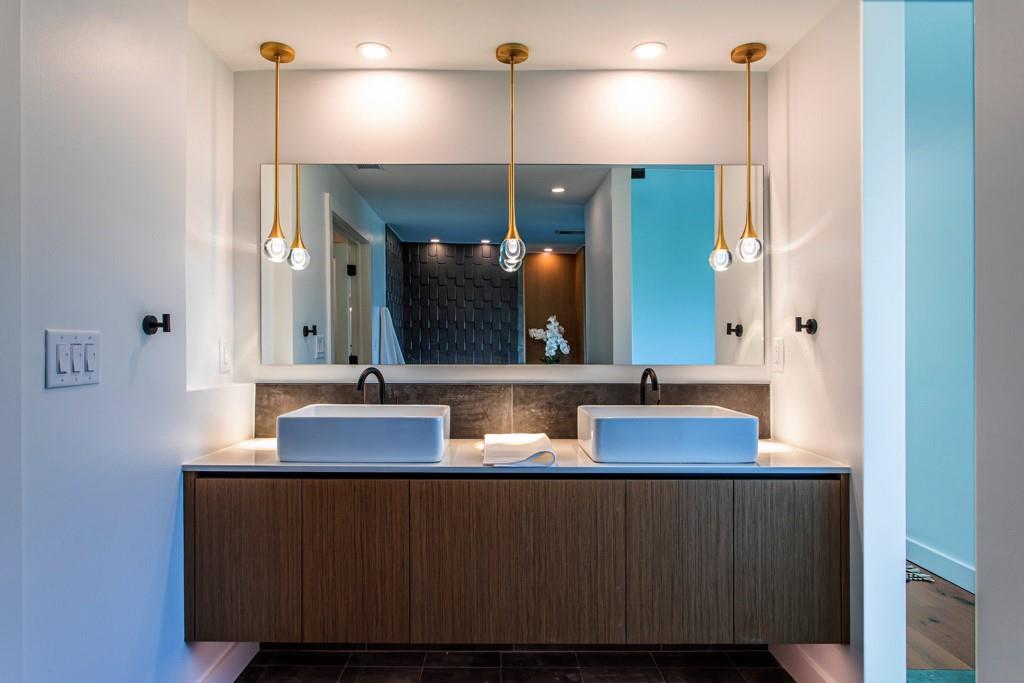 1904 Lenox Road Northeast Atlanta, GA 30306 - Photo 28 of 56 a bathroom with a sink and a mirror