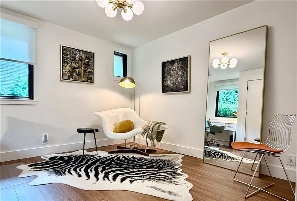 1904 Lenox Road Northeast Atlanta, GA 30306 - Photo 29 of 56 a living room with furniture and a window