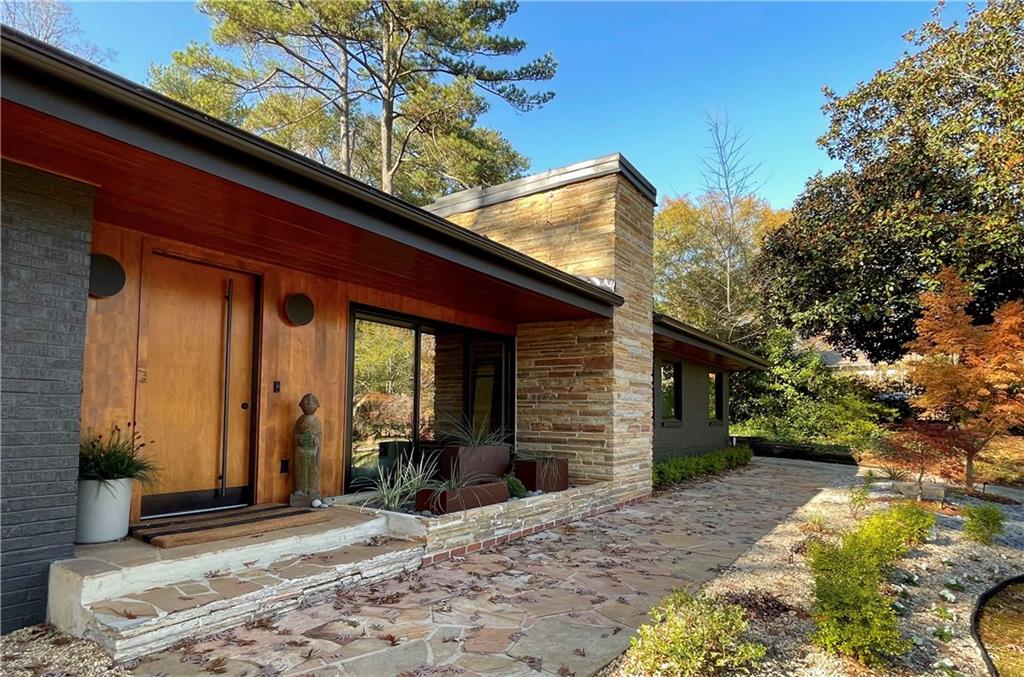 1904 Lenox Road Northeast Atlanta, GA 30306 - Photo 3 of 56 a view of a house with a patio