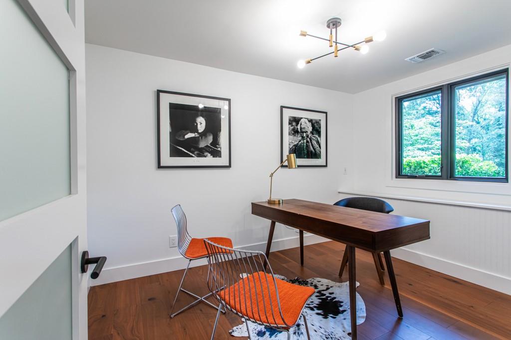 1904 Lenox Road Northeast Atlanta, GA 30306 - Photo 33 of 56 a view of a workspace with furniture and a window