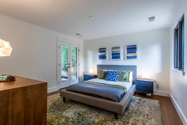 a view of a park with large trees