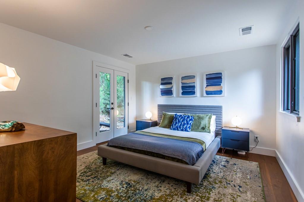 1904 Lenox Road Northeast Atlanta, GA 30306 - Photo 36 of 56 a bedroom with a bed and window