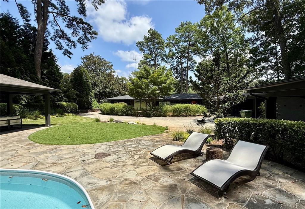 1904 Lenox Road Northeast Atlanta, GA 30306 - Photo 40 of 56 a view of a backyard with sitting area