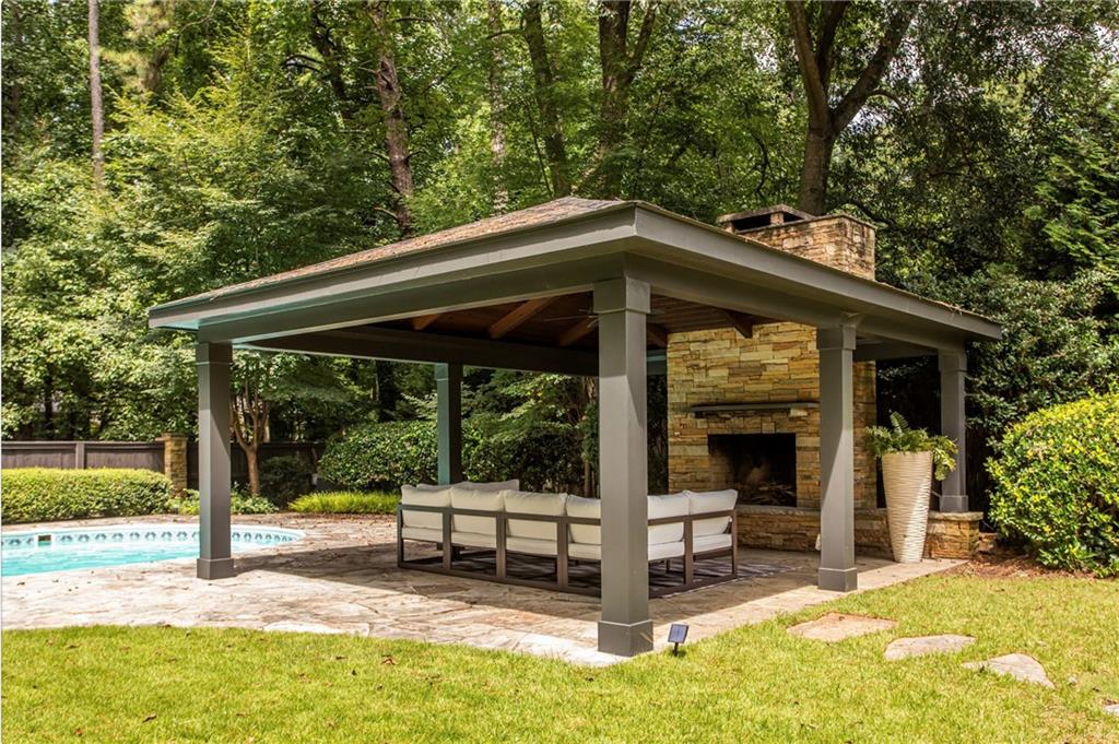 1904 Lenox Road Northeast Atlanta, GA 30306 - Photo 43 of 56 a house with trees in front of it