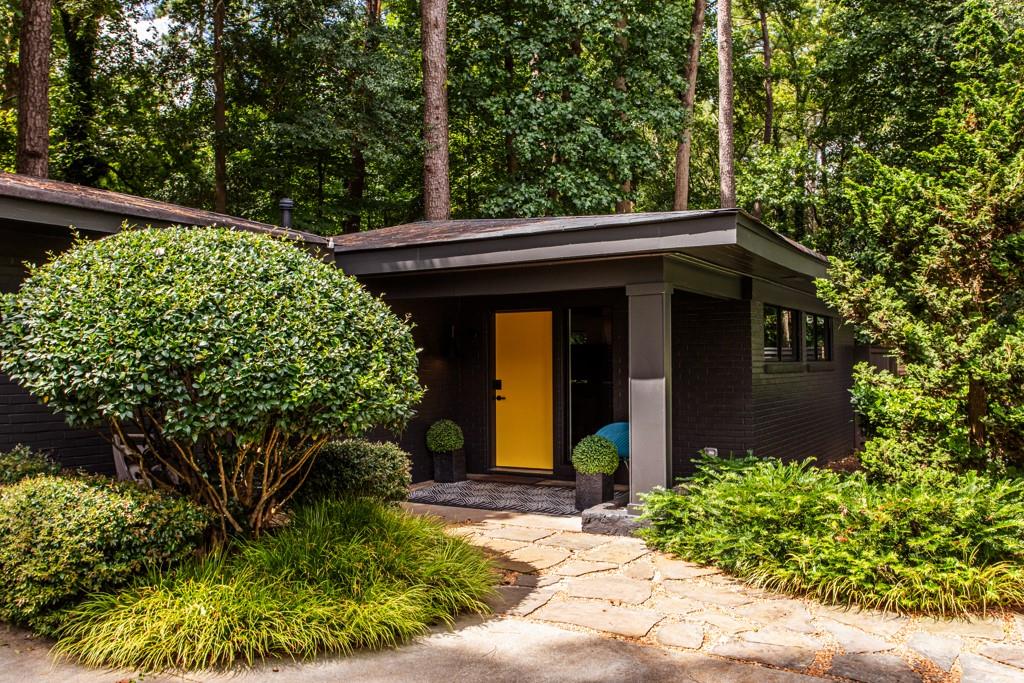 1904 Lenox Road Northeast Atlanta, GA 30306 - Photo 45 of 56 a view of a house with potted plants
