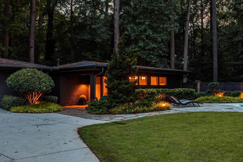 1904 Lenox Road Northeast Atlanta, GA 30306 - Photo 46 of 56 a view of a backyard with plants and patio