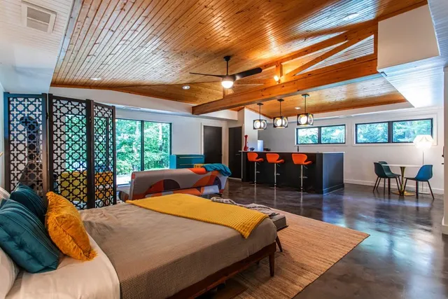 a view of two chairs in the patio