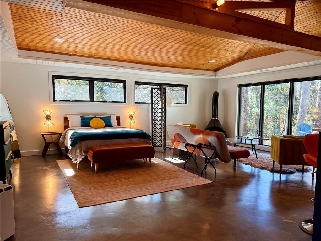 1904 Lenox Road Northeast Atlanta, GA 30306 - Photo 49 of 56 a bedroom with furniture and a large window