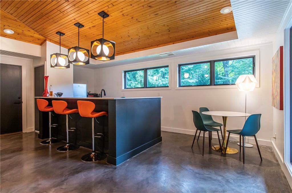1904 Lenox Road Northeast Atlanta, GA 30306 - Photo 50 of 56 a view of a dining room with furniture window and wooden floor
