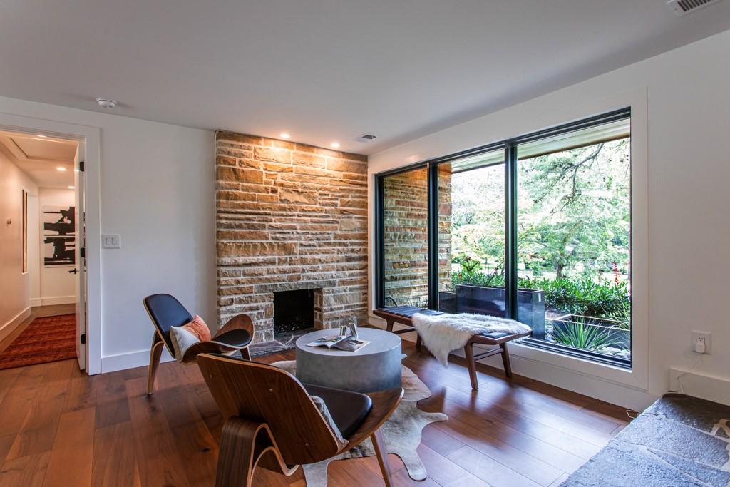 1904 Lenox Road Northeast Atlanta, GA 30306 - Photo 8 of 56 a living room with furniture and a fireplace