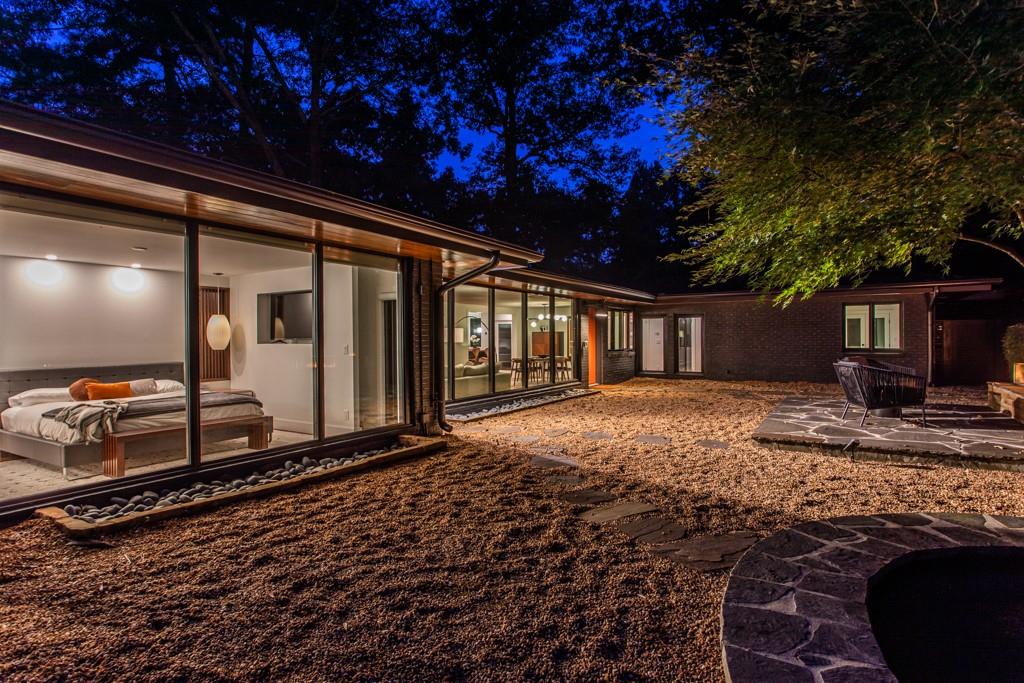 1904 Lenox Road Northeast Atlanta, GA 30306 - Photo 9 of 56 a front view of a house with garden