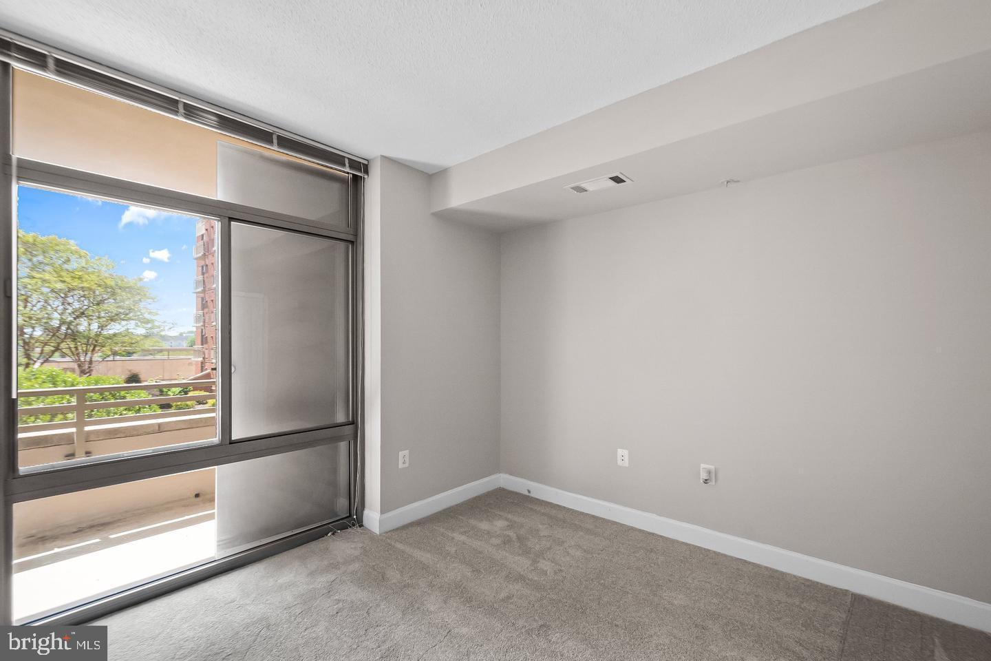 3600 South Glebe Road, Unit 330W Arlington, VA 22202 - Photo 19 of 35 a view of an empty room and window