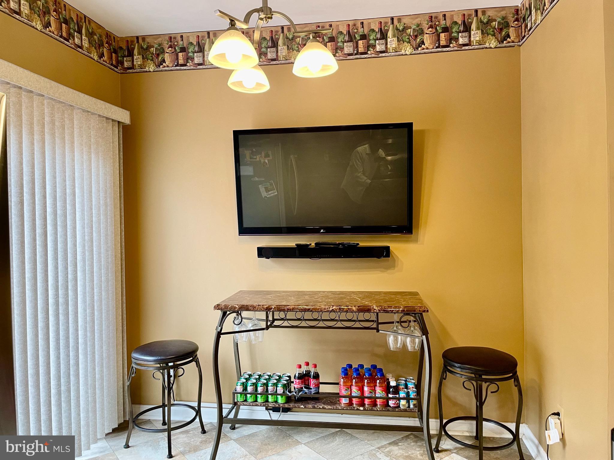 7921 Bent Bough Road Severn, MD 21144 - Photo 16 of 35 Kitchen - 50" TV w/Yamaha Sound bar