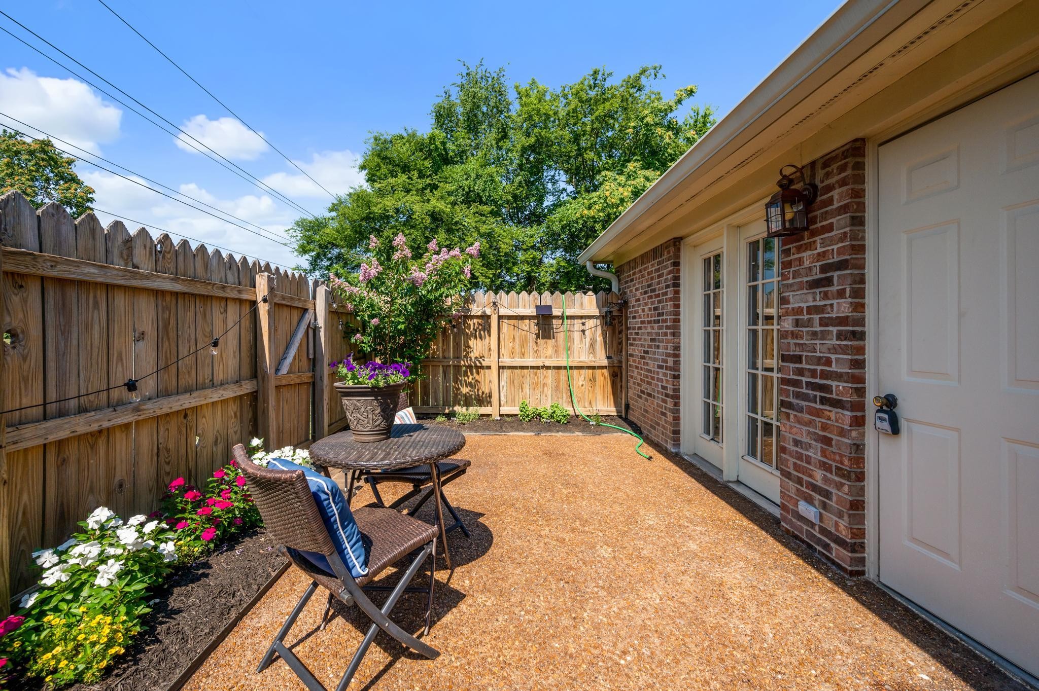 764 Kent Road Nashville, TN 37214 - Photo 18 of 20 a view of a chairs and tables in the back yard of the house