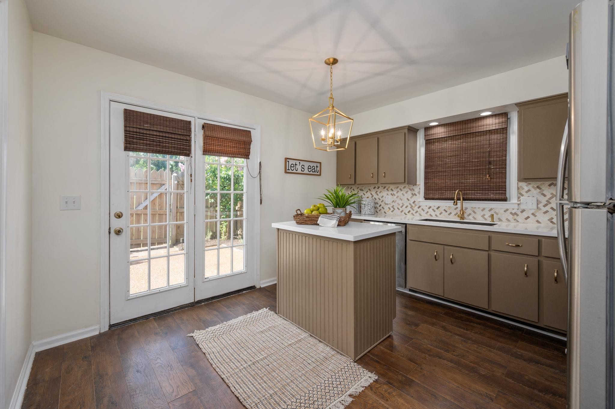 764 Kent Road Nashville, TN 37214 - Photo 6 of 20 a kitchen with sink cabinets and window