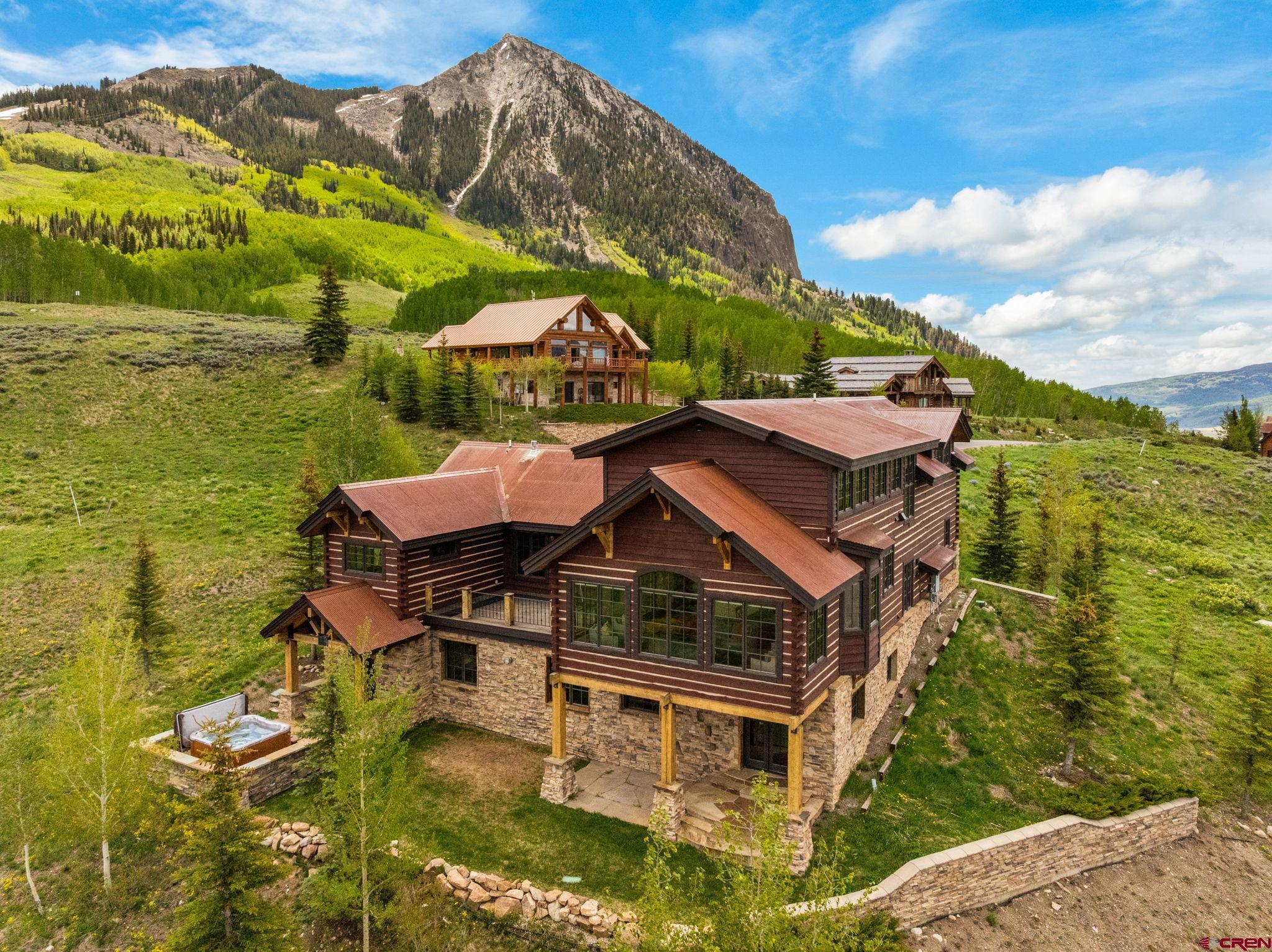 a aerial view of a house with a ocean view