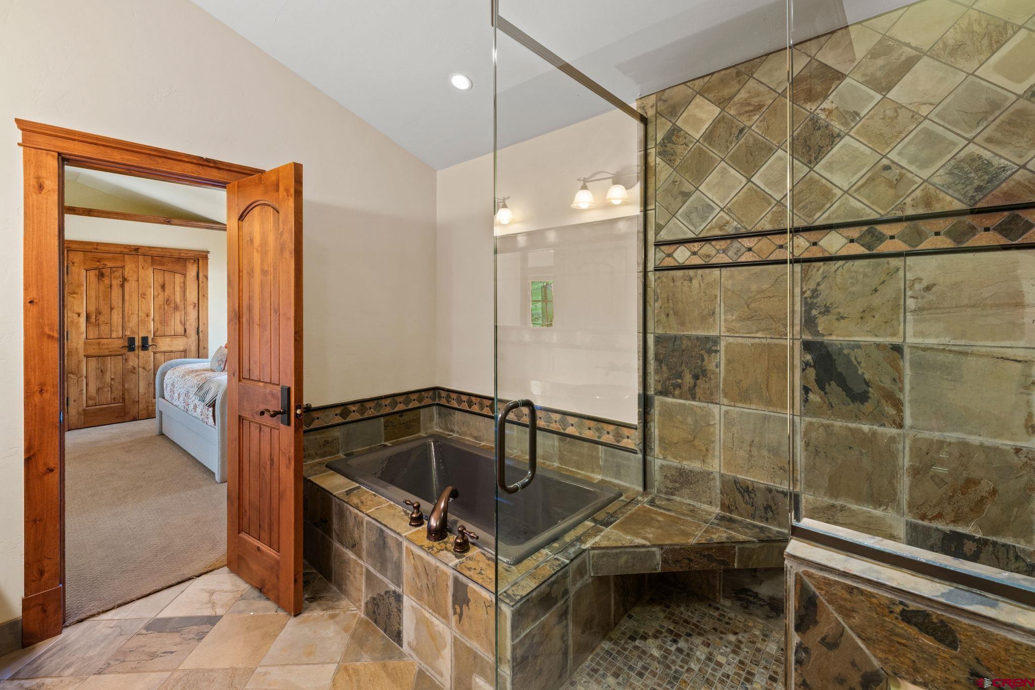 59 Summit Road Crested Butte, CO 81225 - Photo 22 of 45 a bathroom with a sink and tub