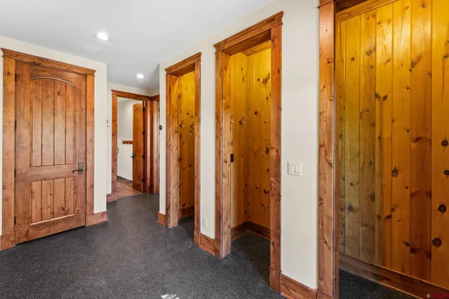 a view of a bathroom with closet area