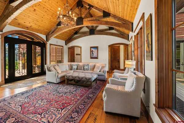 a living room with furniture and a rug