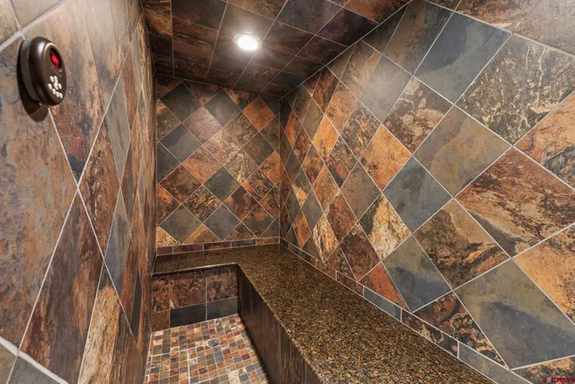 a view of a backyard with sitting area