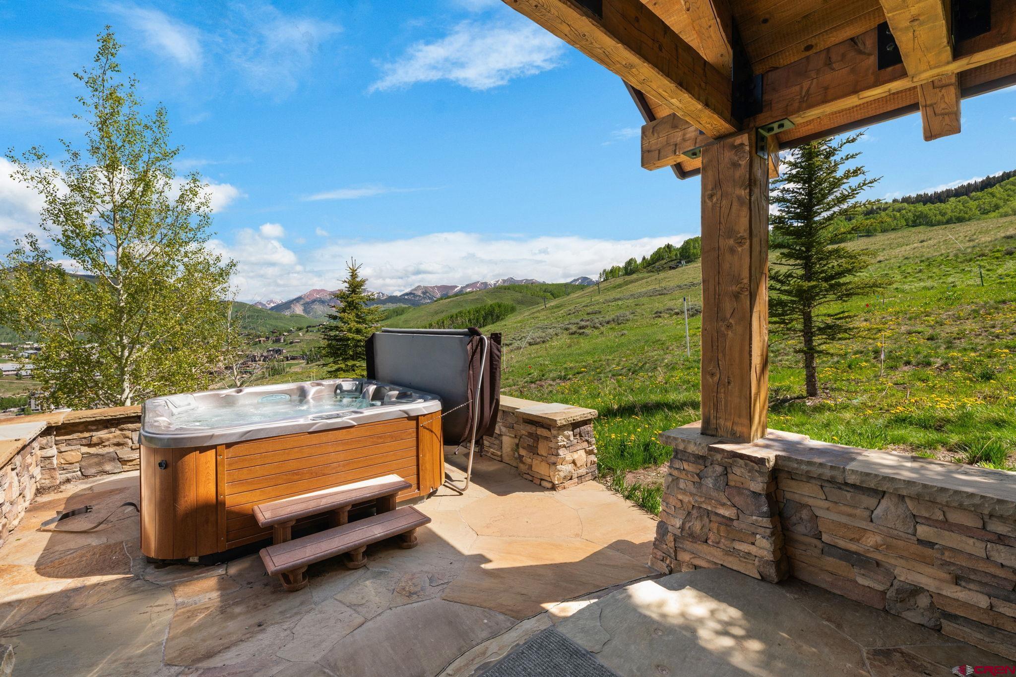 59 Summit Road Crested Butte, CO 81225 - Photo 43 of 45 a view of a backyard with sitting area