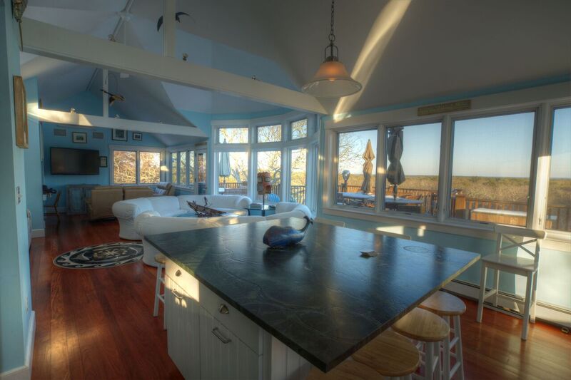 72 Chappaquiddick Road Edgartown, MA 02539 - Photo 6 of 13 a view of kitchen and dining room with wooden floor