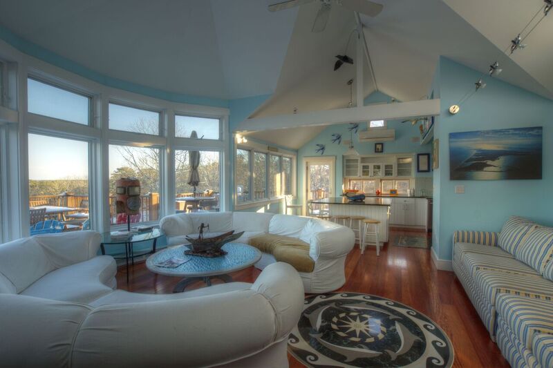 72 Chappaquiddick Road Edgartown, MA 02539 - Photo 7 of 13 a living room with furniture and a large window