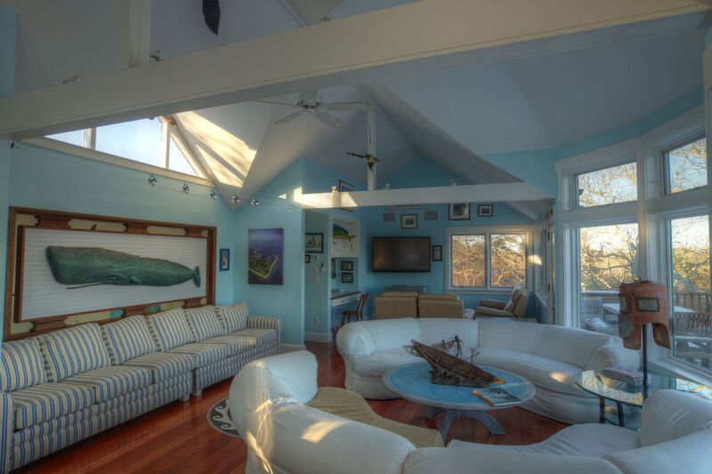 72 Chappaquiddick Road Edgartown, MA 02539 - Photo 8 of 13 a living room with furniture and a flat screen tv