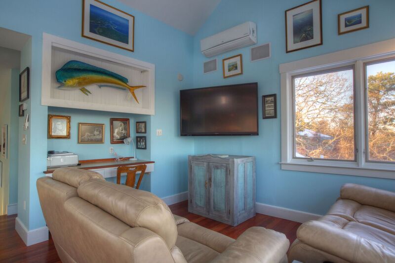 72 Chappaquiddick Road Edgartown, MA 02539 - Photo 10 of 13 a living room with furniture and a flat screen tv