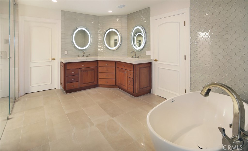 33821 Via Capri Avenue Dana Point, CA 92629 - Photo 11 of 42 PRIMARY BATH WITH SEPARATE FREE STANDING TUB & DUAL VANITY SINKS