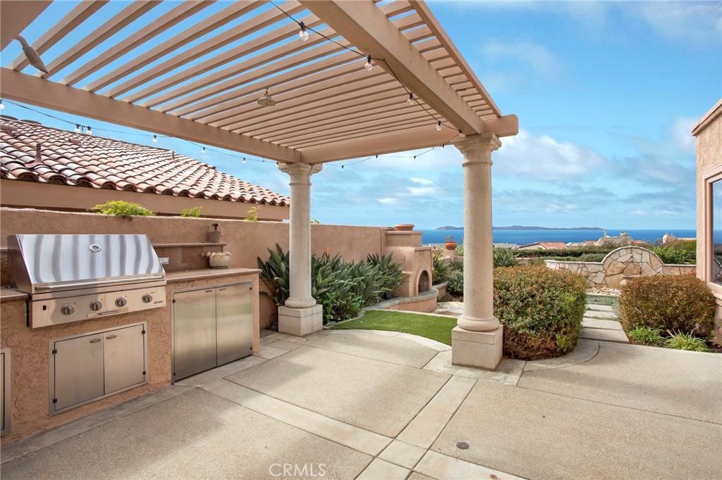 33821 Via Capri Avenue Dana Point, CA 92629 - Photo 3 of 42 OUTDOOR FIREPLACE & BUILT-IN BBQ